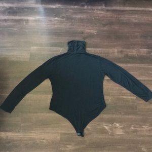 Black turtleneck bodysuit